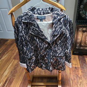 Coleen Lopez, 10, Black and beige lace jacket